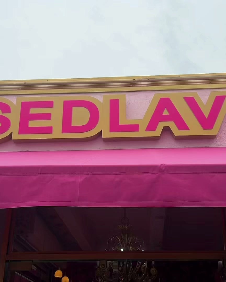 The pink SEDLAV storefront on NW 20th Street, Miami