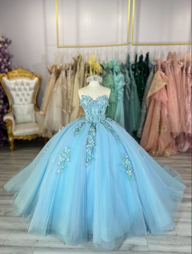 Sky blue tulle quinceañera ball gown with floral appliqués